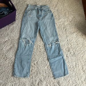 high waisted jeans with knee cuts